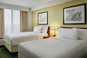 Premium bedding, pillowtop beds, desk, blackout drapes