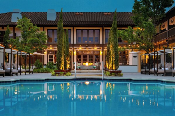 Outdoor pool, open 8 AM to 10 PM, pool cabanas (surcharge)