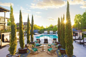 Outdoor pool, open 8 AM to 10 PM, cabanas (surcharge), pool umbrellas