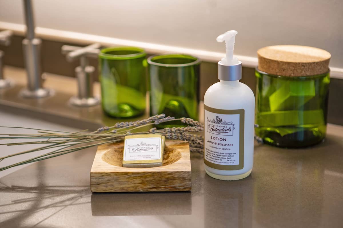 designer toiletries, hair dryer, bathrobes, towels