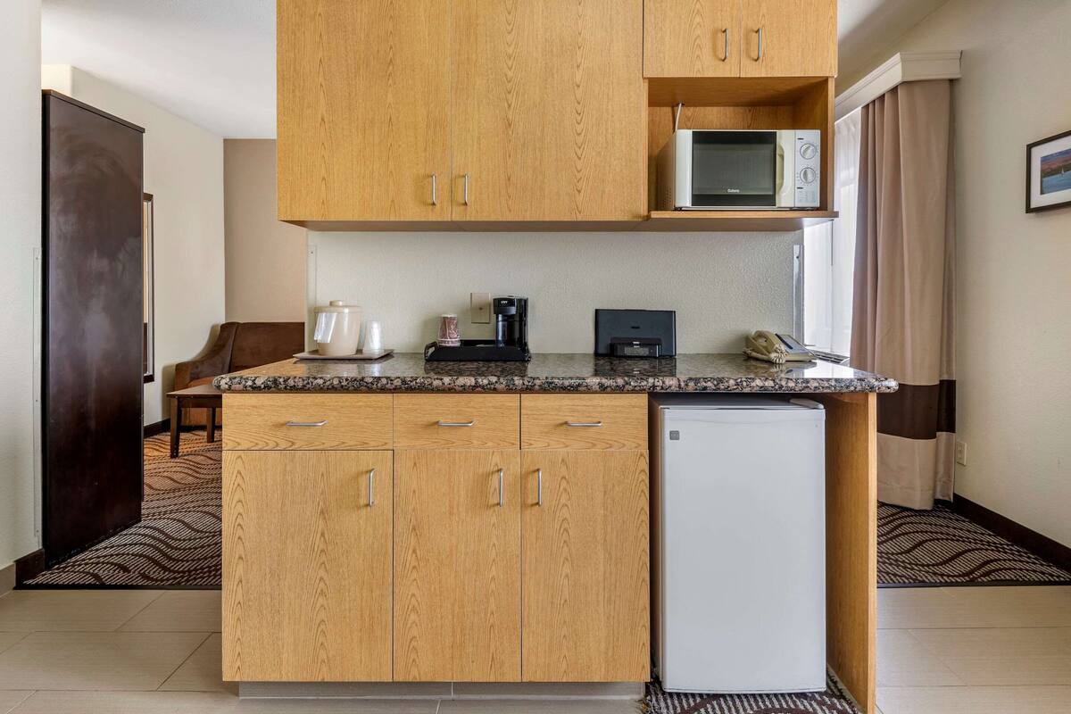 desk, laptop workspace, iron/ironing board, free cots/infant beds