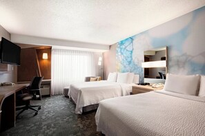 Premium bedding, desk, laptop workspace, blackout curtains