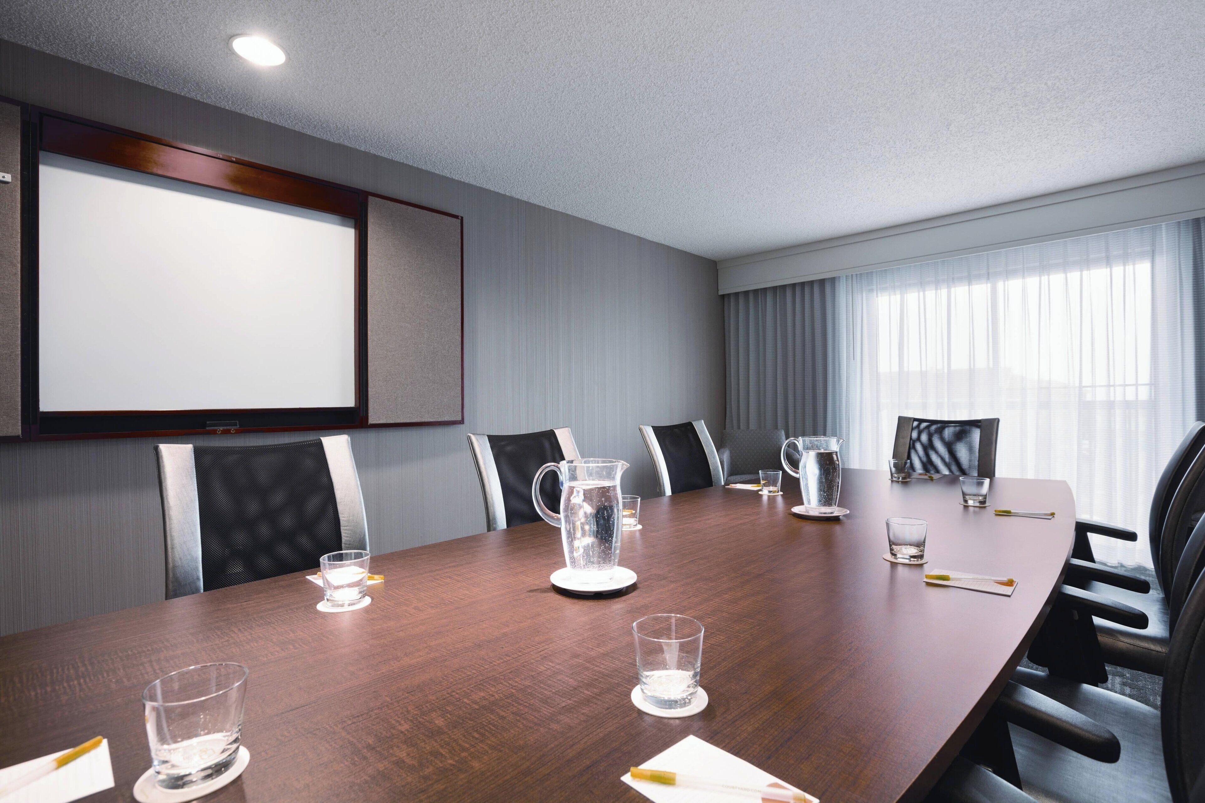 premium bedding, desk, laptop workspace, blackout curtains