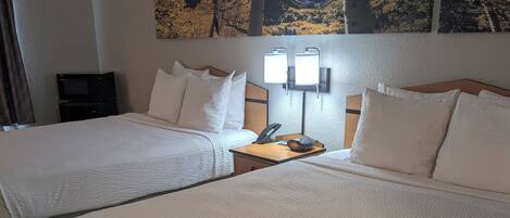 Standard Room, 2 Queen Beds | Blackout drapes, iron/ironing board, free cribs/infant beds, free WiFi