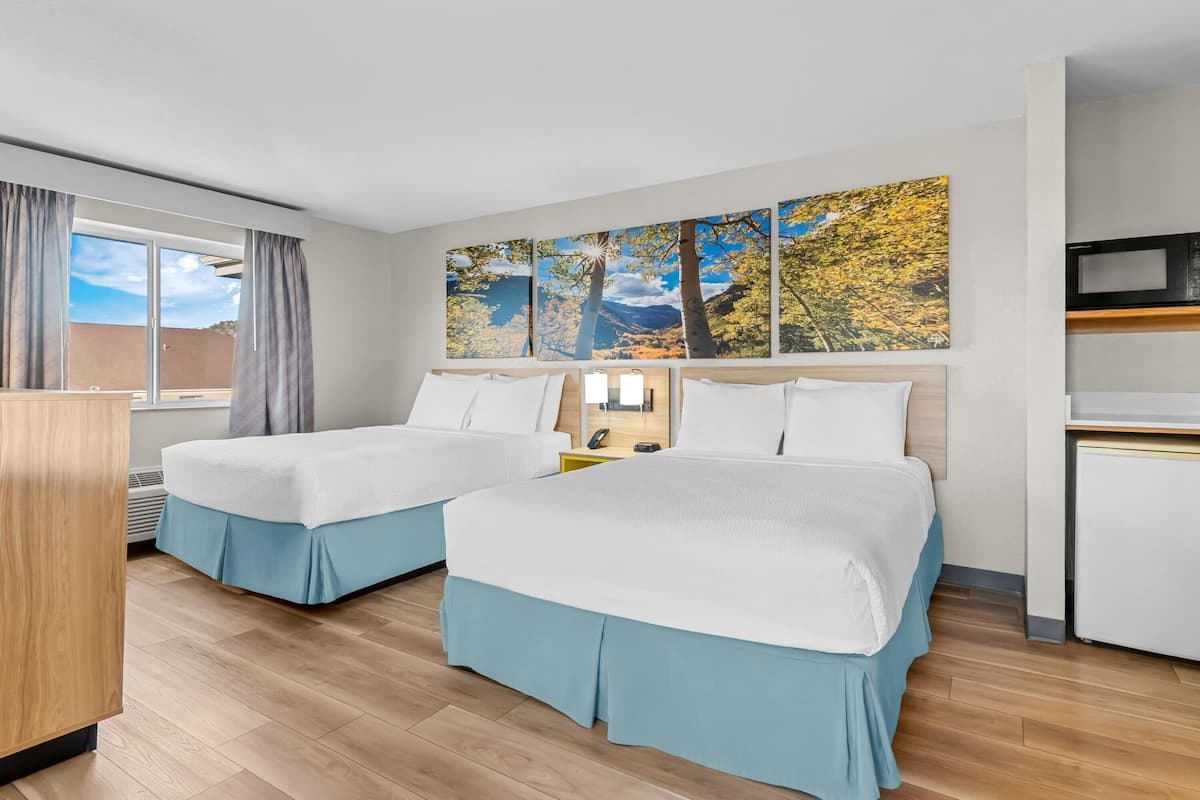 Studio Suite, 2 Queen Beds, Non Smoking | Blackout curtains, iron/ironing board, free cots/infant beds, free WiFi