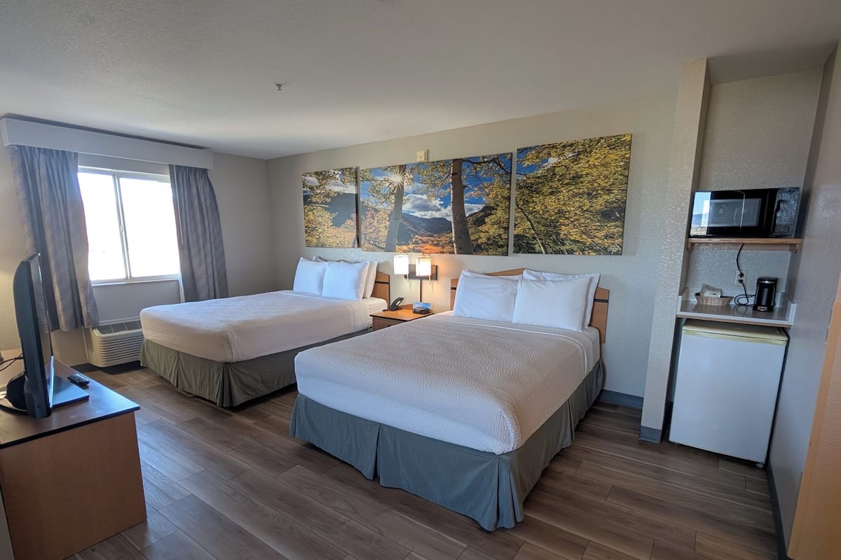 Studiosuite, 2 Queen-Betten, Nichtraucher | Verdunkelungsvorhänge, Bügeleisen/Bügelbrett, kostenlose Babybetten