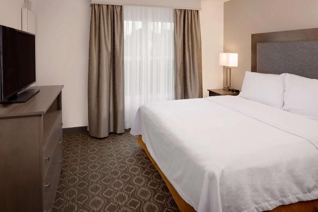 Premium bedding, desk, blackout curtains, iron/ironing board