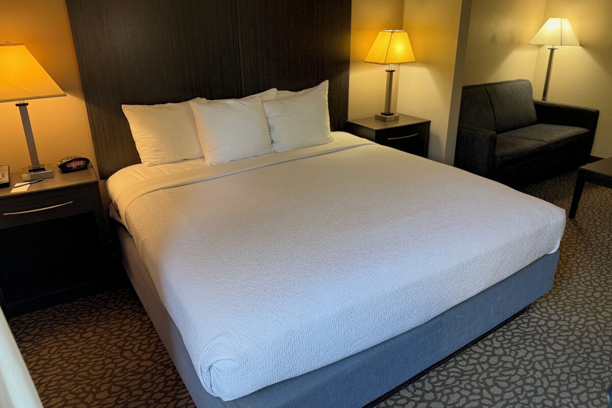 Suite, 1 King Bed with Sofa bed, Non Smoking | Desk, laptop workspace, iron/ironing board, free cots/infant beds