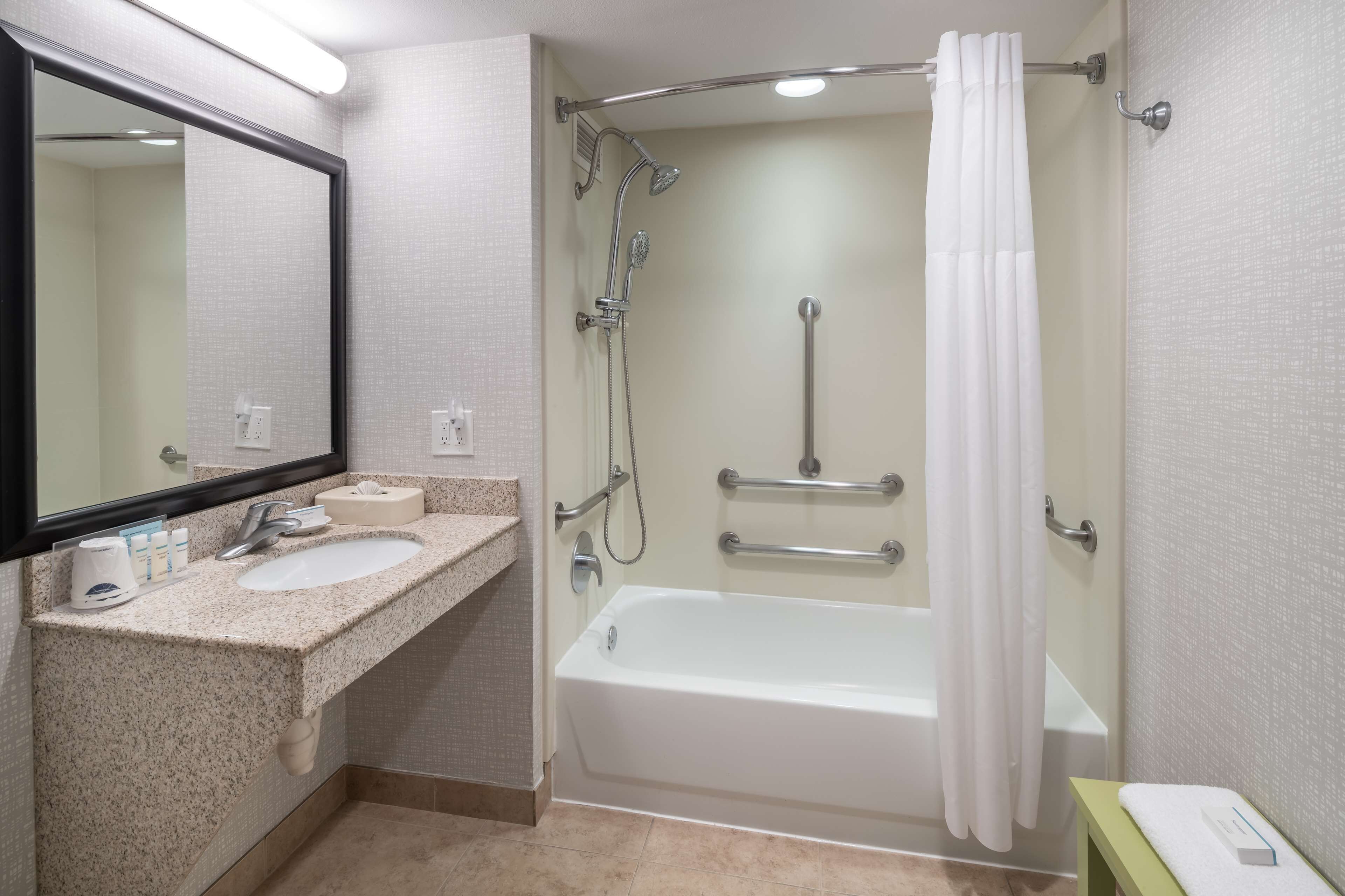 combined shower/bathtub, free toiletries, hair dryer, towels