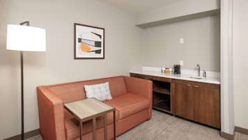 Suite, 1 King Bed, Kitchenette | Living area | 32-inch LCD TV with cable channels, TV