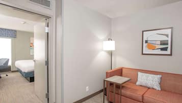 Suite, 1 King Bed, Kitchenette | Living area | 32-inch LCD TV with cable channels, TV