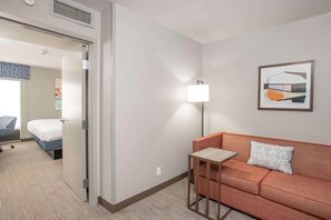 Suite, 1 King Bed, Kitchenette | Living area | 32-inch LCD TV with cable channels, TV