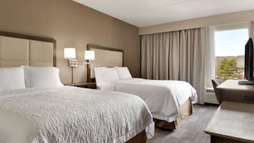 Desk, laptop workspace, blackout drapes, iron/ironing board