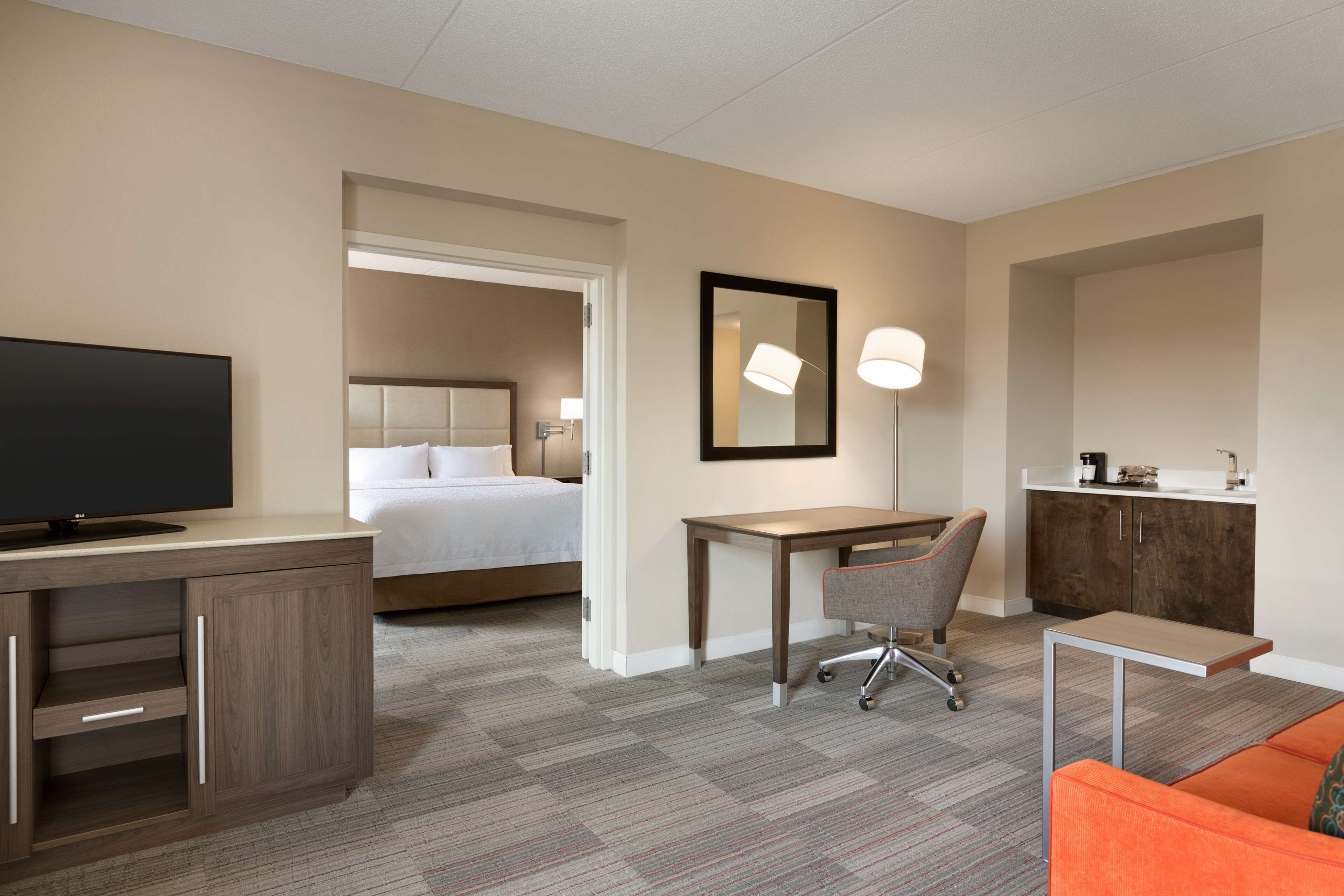 Suite, 1 King Bed, Refrigerator &amp; Microwave (Wet bar) | Desk, laptop workspace, blackout drapes, iron/ironing board