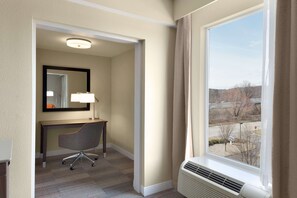 Desk, laptop workspace, blackout curtains, iron/ironing board