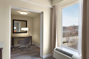 Desk, laptop workspace, blackout curtains, iron/ironing board