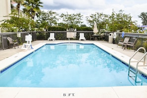 Outdoor pool, open 9 AM to 10 PM, pool umbrellas, pool loungers