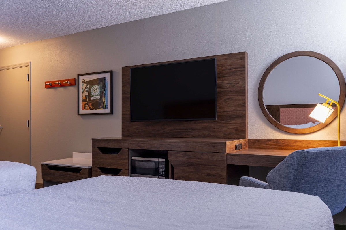 Premium bedding, pillowtop beds, desk, blackout drapes