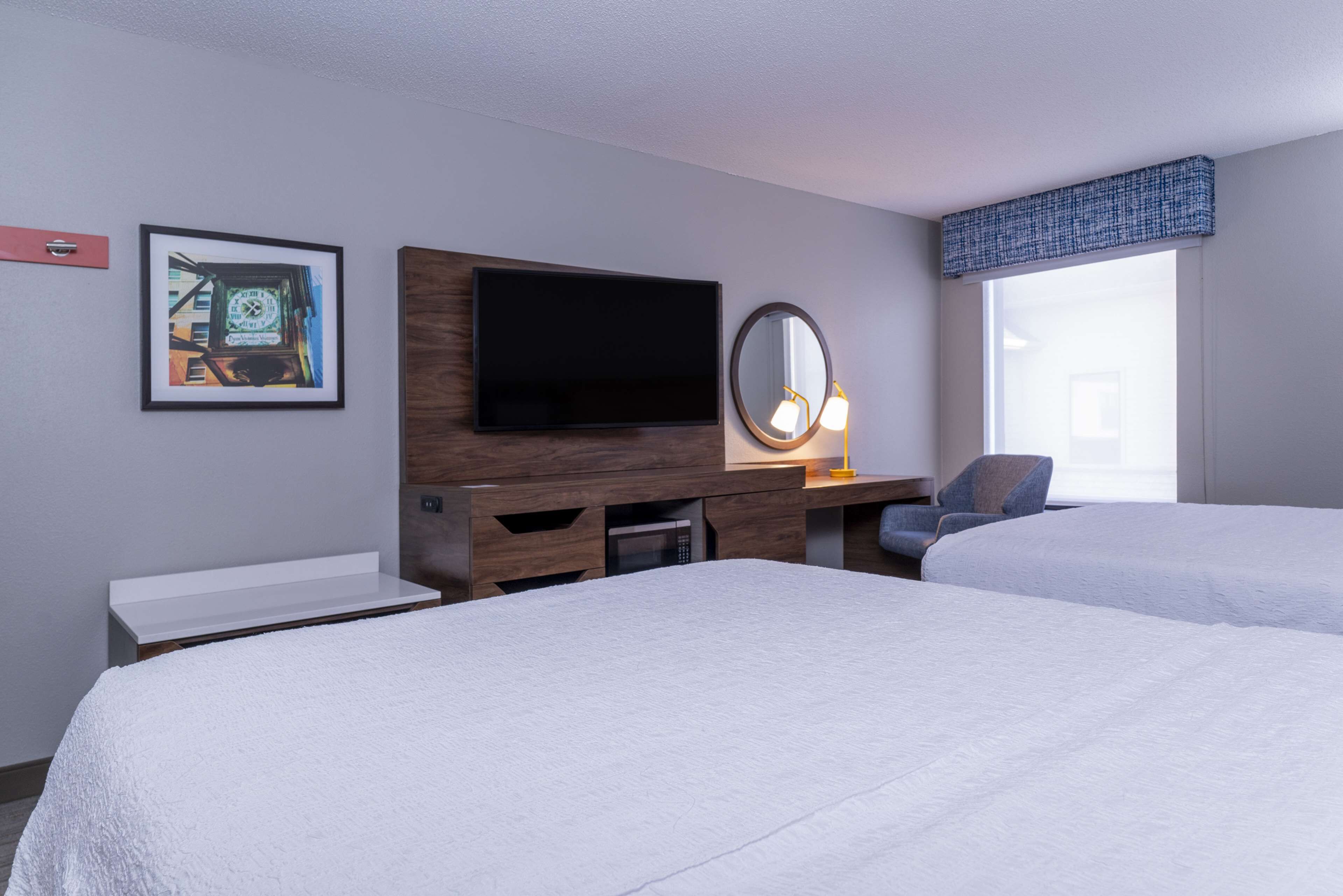 premium bedding, pillow-top beds, desk, blackout curtains