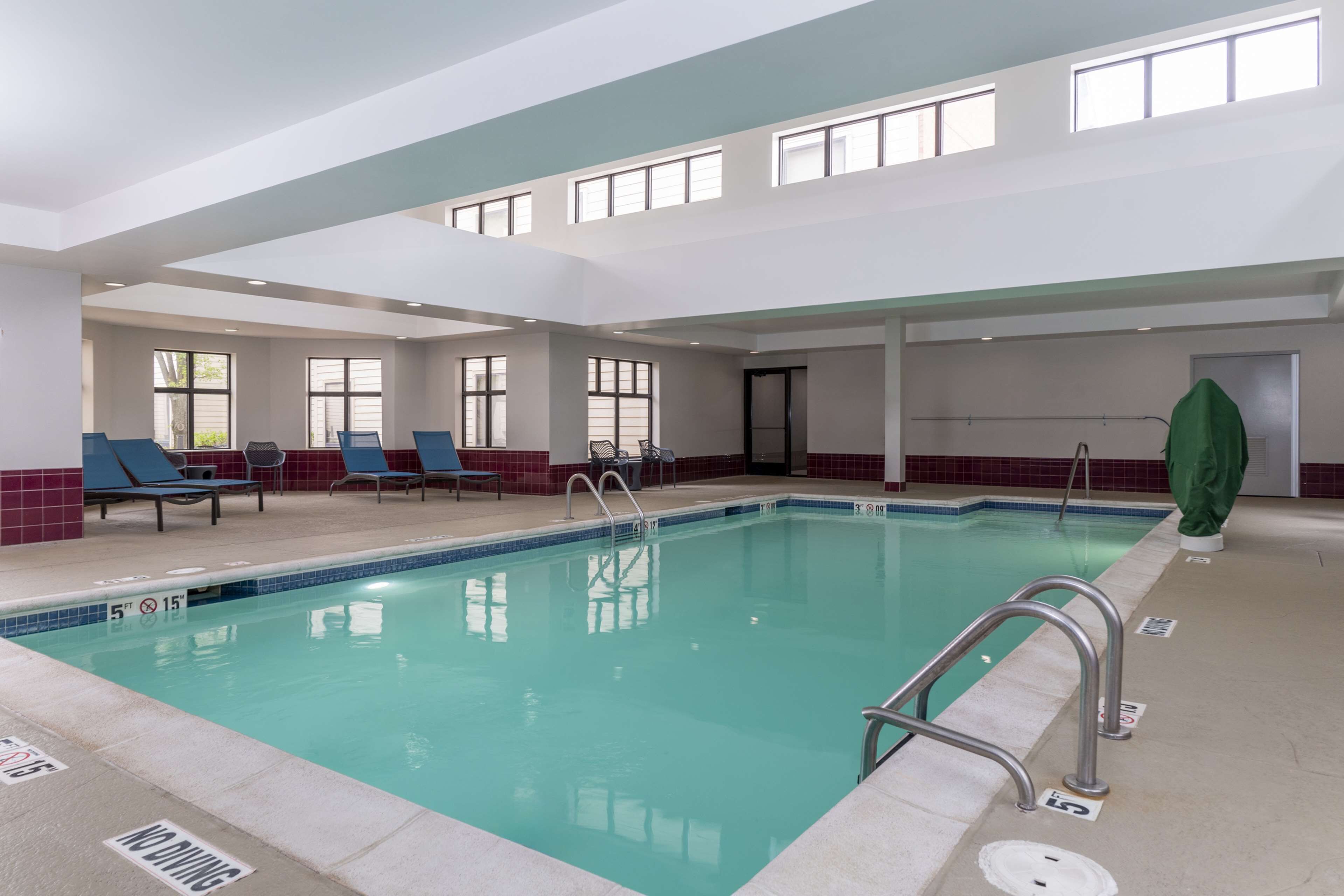 indoor pool, open 9:00 am to 10:00 pm, pool loungers
