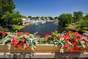 Desk, laptop workspace, blackout drapes, iron/ironing board