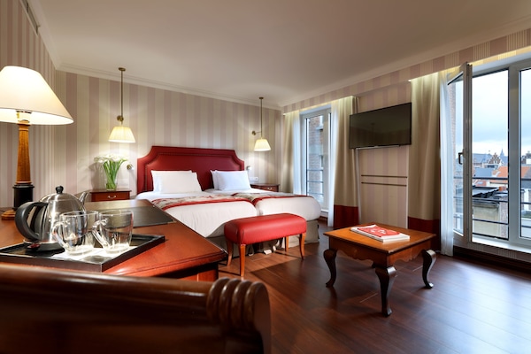 Minibar, coffres-forts dans les chambres, décoration personnalisée