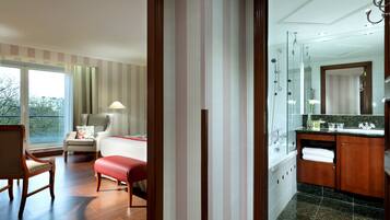 Deluxe Single Room | Minibar, in-room safe, individually decorated, desk