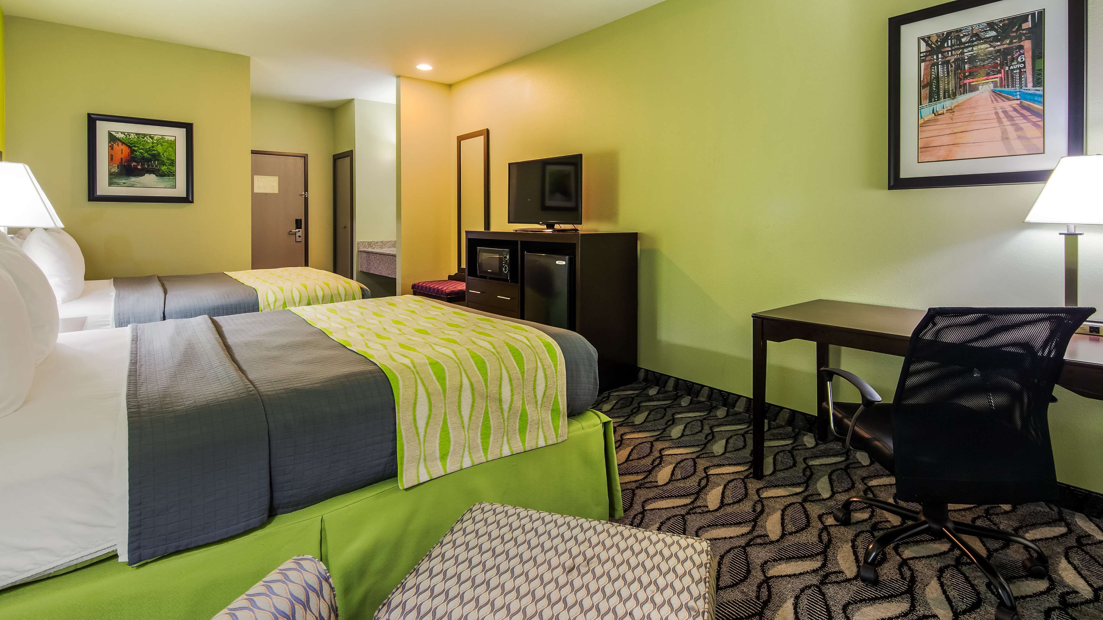 standard room, 2 queen beds, non smoking, jetted tub | desk, soundproofing, iron/ironing board, free cots/infant beds