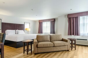 Suite, Multiple Beds (1 King Bed 1 Queen Bed) | Desk, blackout drapes, free WiFi, bed sheets