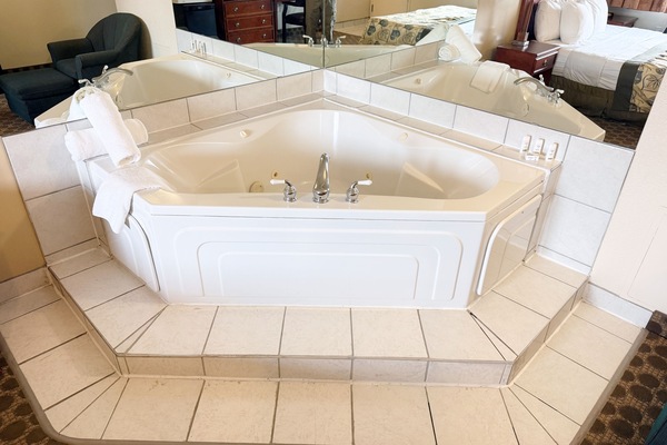 Suite, 1 King Bed, Non Smoking, Jetted Tub | Premium bedding, desk, blackout drapes, iron/ironing board