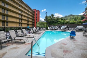 Seasonal outdoor pool, open 8:00 AM to 10:00 PM, sun loungers