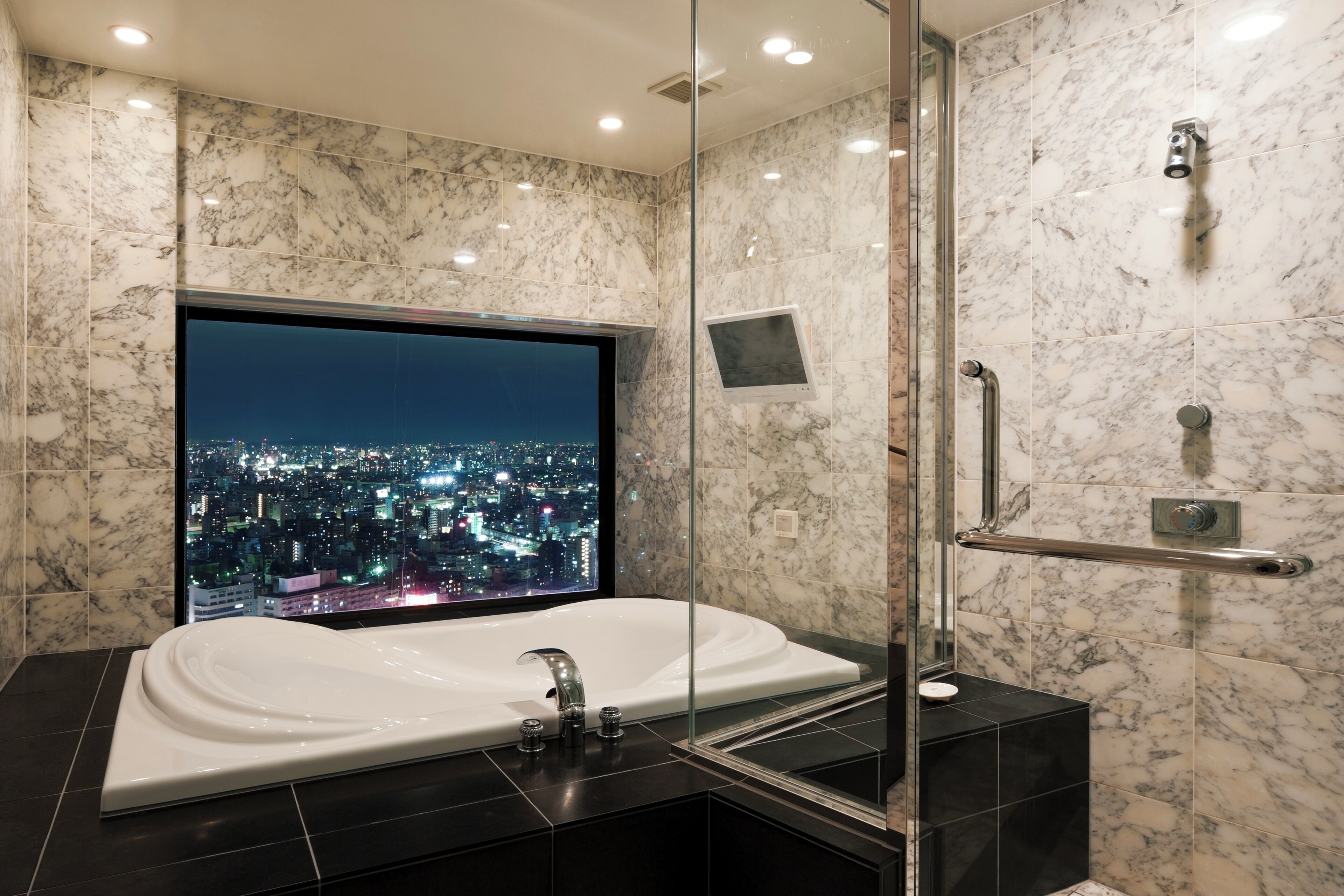 bathtub, free toiletries, hair dryer, slippers