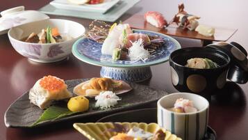 A variety of Japanese dishes arranged on a table.