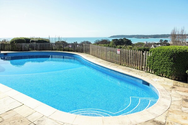 Seasonal outdoor pool, pool umbrellas