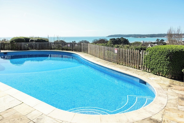 Seasonal outdoor pool, pool umbrellas