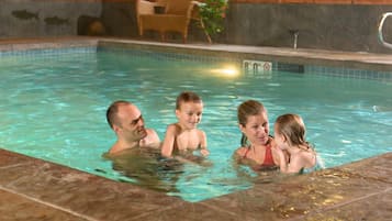 Indoor pool, open 9:00 AM to 10:00 PM, pool loungers