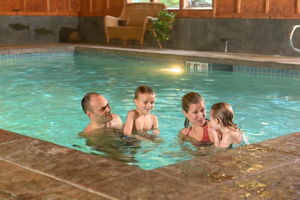 Indoor pool, open 9:00 AM to 10:00 PM, pool loungers