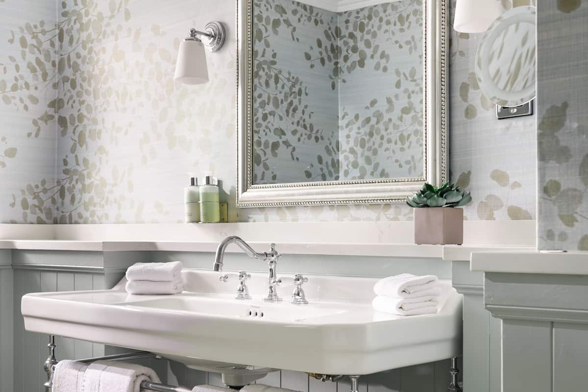 combined shower/bathtub, designer toiletries, hair dryer, bathrobes