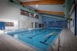 Indoor pool, open 8 AM to 9 PM, sun loungers, lifeguards on site