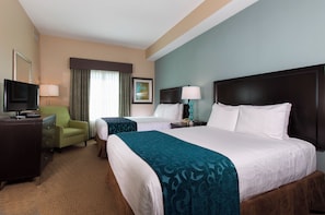 A hotel room with two beds, a TV, a desk, and a chair. - The Palms at 8303 - Lake Buena Vista (Orlando)