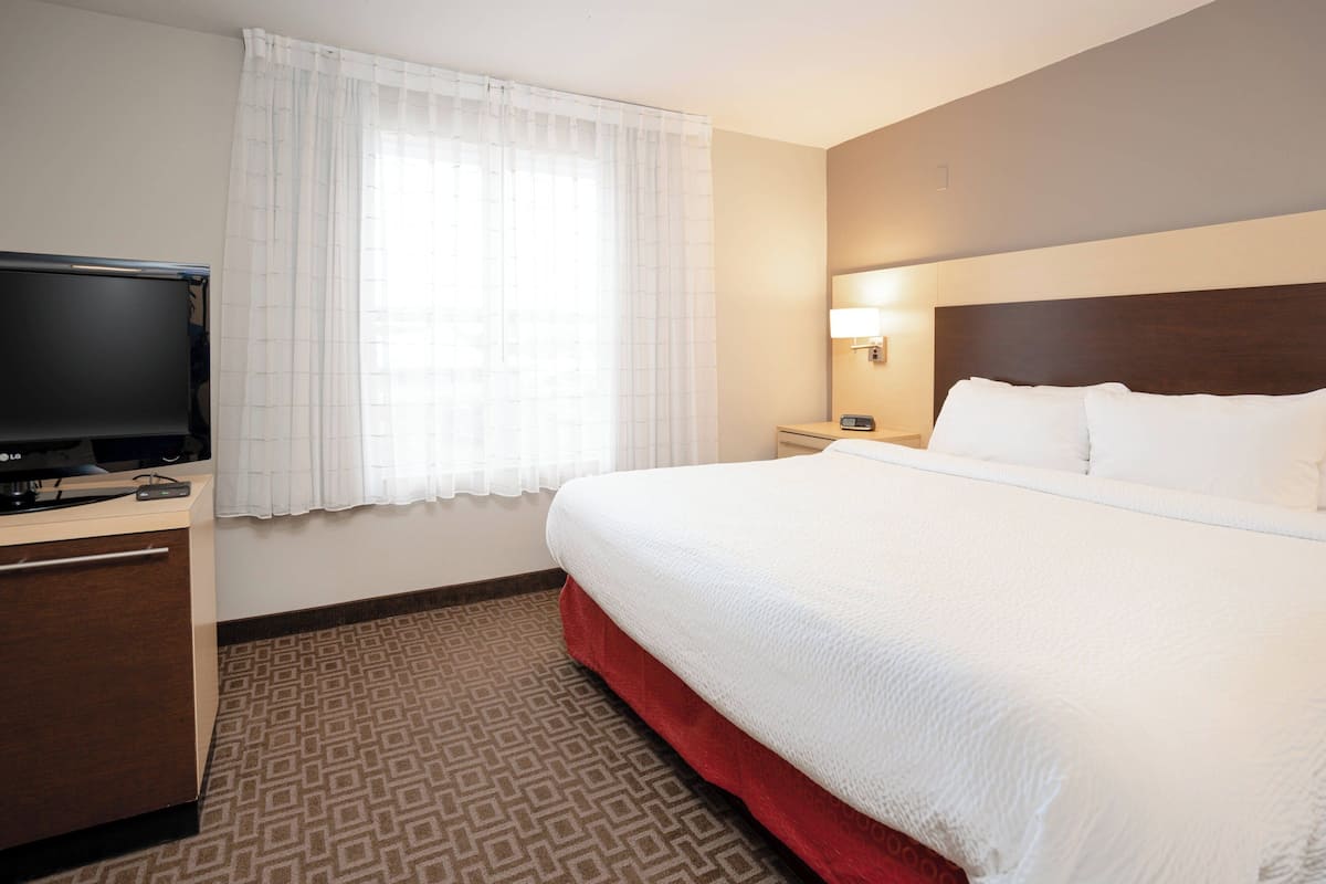 Premium bedding, desk, blackout drapes, iron/ironing board