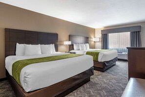 A hotel room with two beds, a large window with curtains, and a carpeted floor. - Comfort Inn & Suites Tualatin - Lake Oswego South (Tualatin)