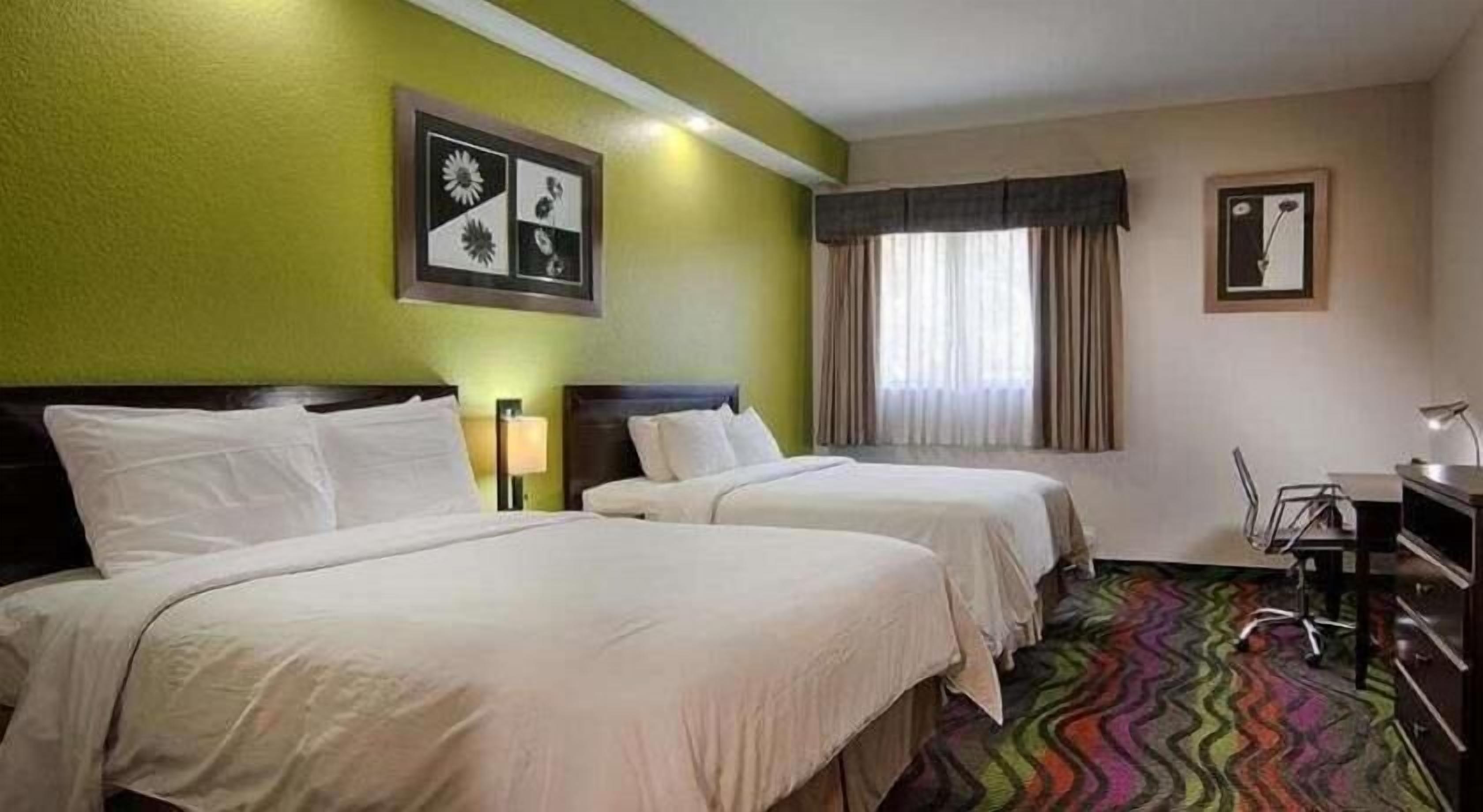 Desk, blackout drapes, iron/ironing board, free WiFi
