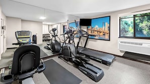 A gym with treadmills, elliptical machines, and a stationary bike. - Best Western The Inn at Ramsey-Mahwah (Ramsey)