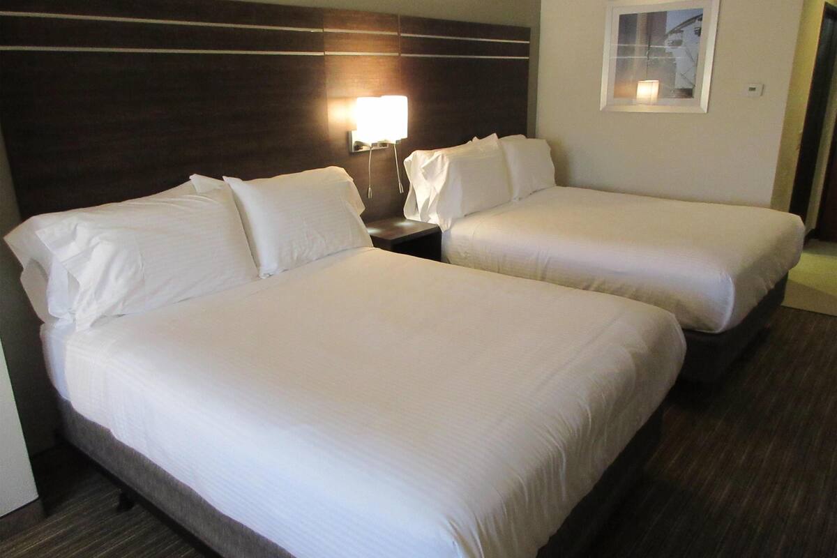 Premium bedding, down comforters, pillowtop beds, desk