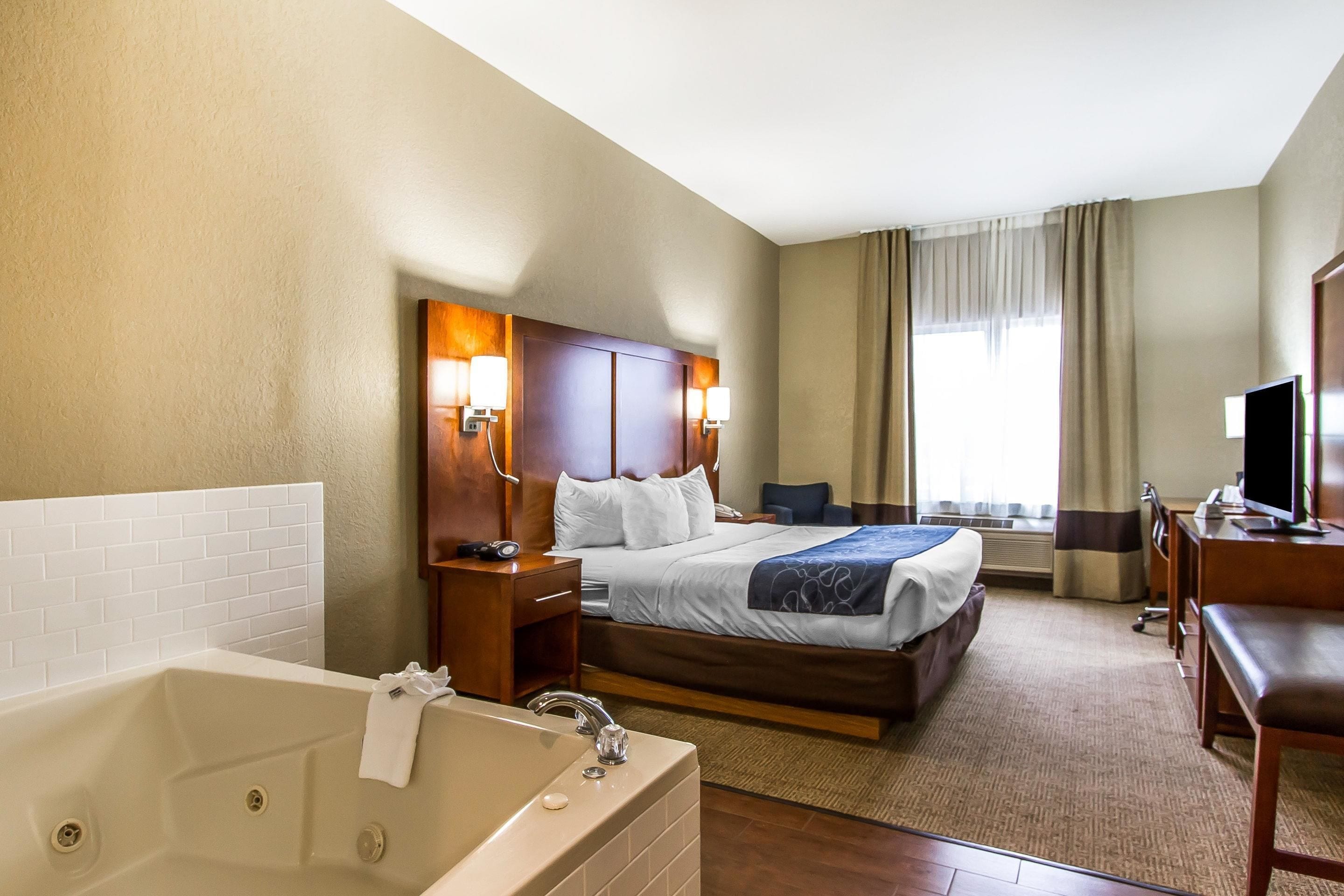 Pillow-top beds, desk, laptop workspace, blackout curtains