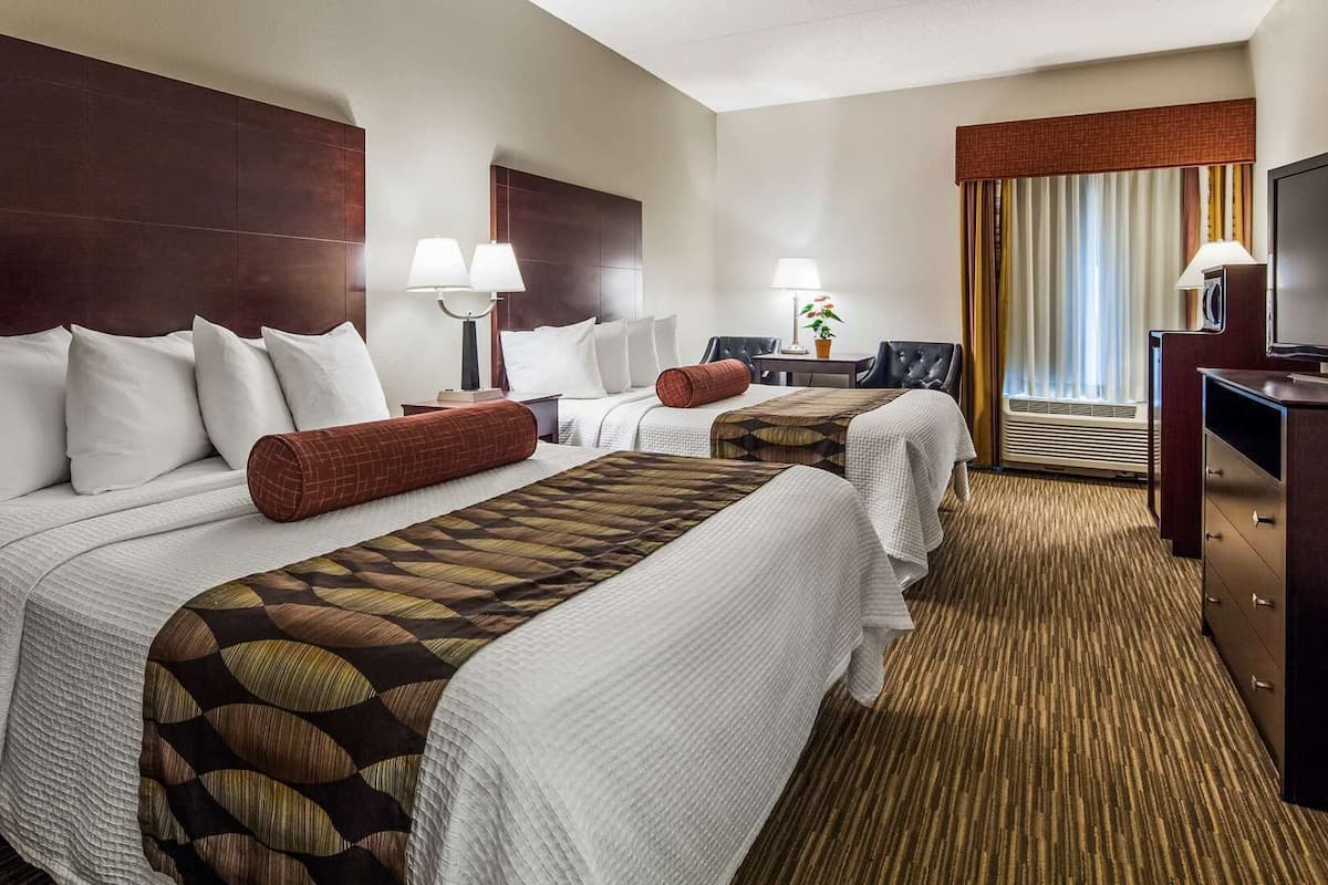 Hypo-allergenic bedding, pillow-top beds, desk, laptop workspace