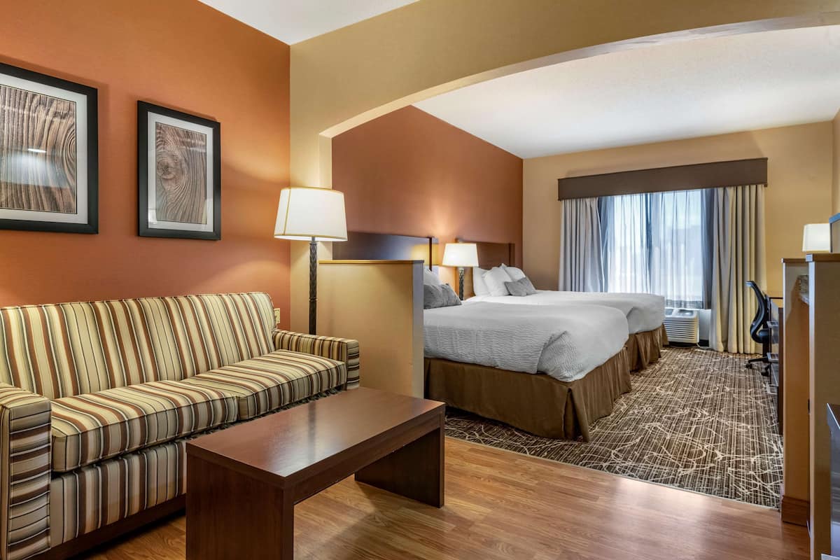 Suite, 2 Queen Beds, Non Smoking, Refrigerator & Microwave (Third bed is a Sofabed) | Desk, laptop workspace, iron/ironing board, free cots/infant beds