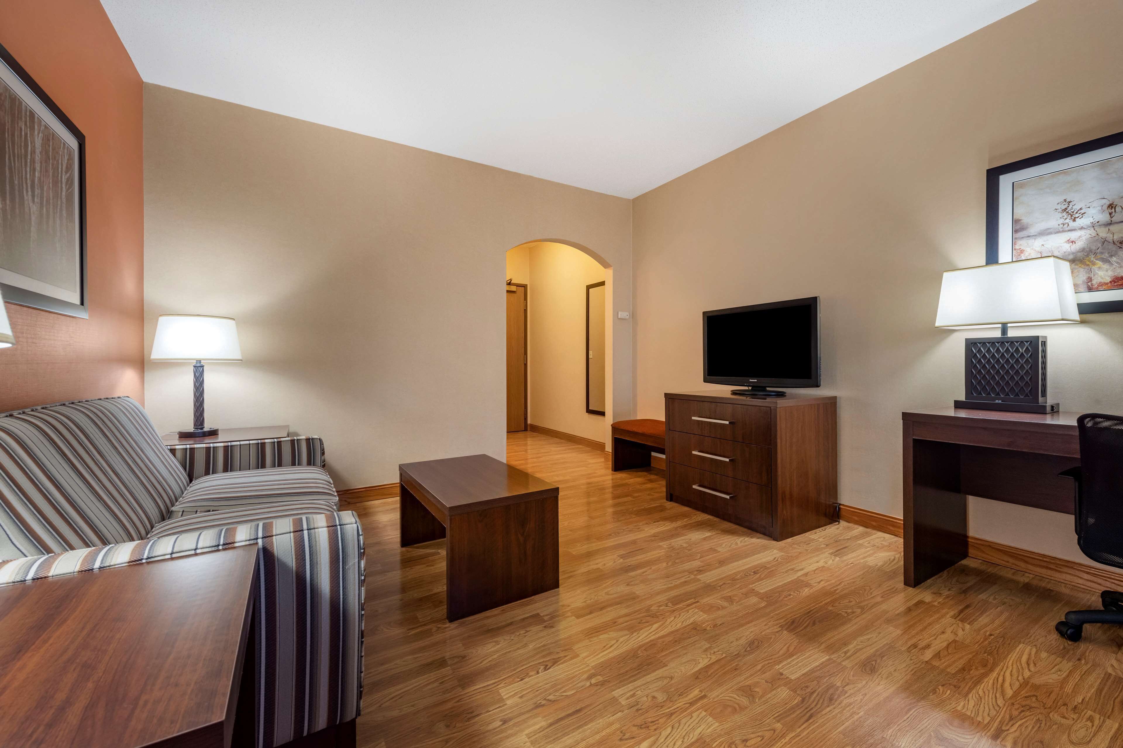 suite, 1 king bed, non smoking, refrigerator & microwave | desk, laptop workspace, iron/ironing board, free cots/infant beds