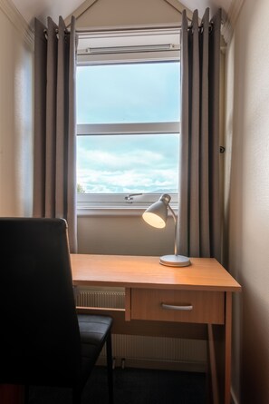 Comfort Quadruple Room | Premium bedding, desk, rollaway beds, bed sheets